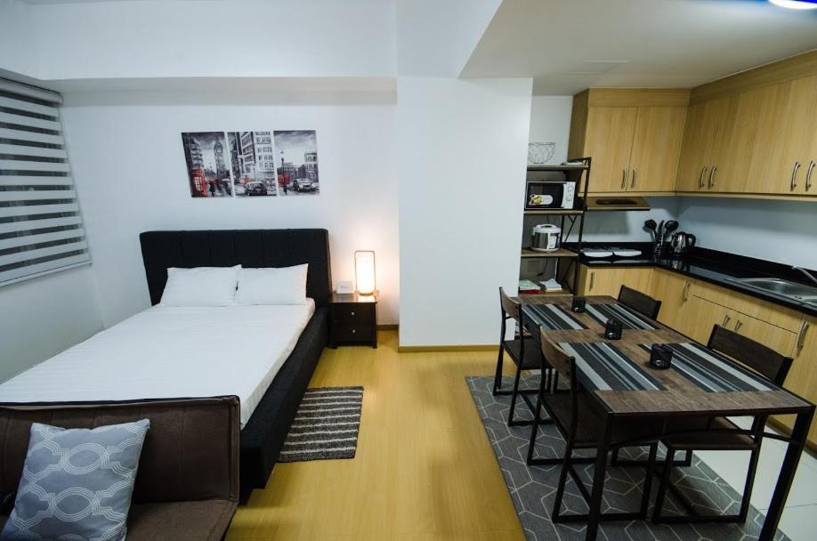 Prime Avant Bgc Location Apartments By Ph Staycation Manila Dış mekan fotoğraf